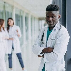 african-american-doctor-man-standing-corridor-hospital