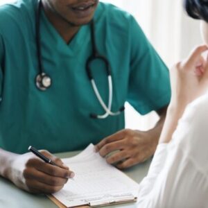 Doctor diagnose patient symptoms at the hospital